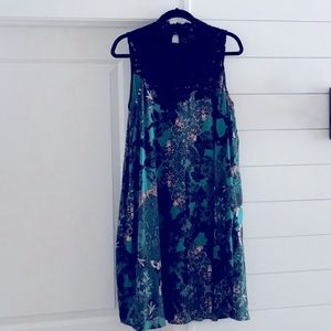 Maeve sleeveless silk swing dress with pockets